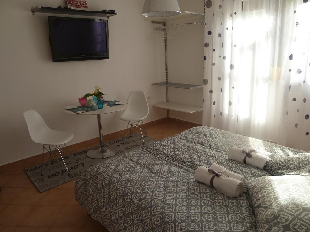 Rose Apartments Icici Quarto foto